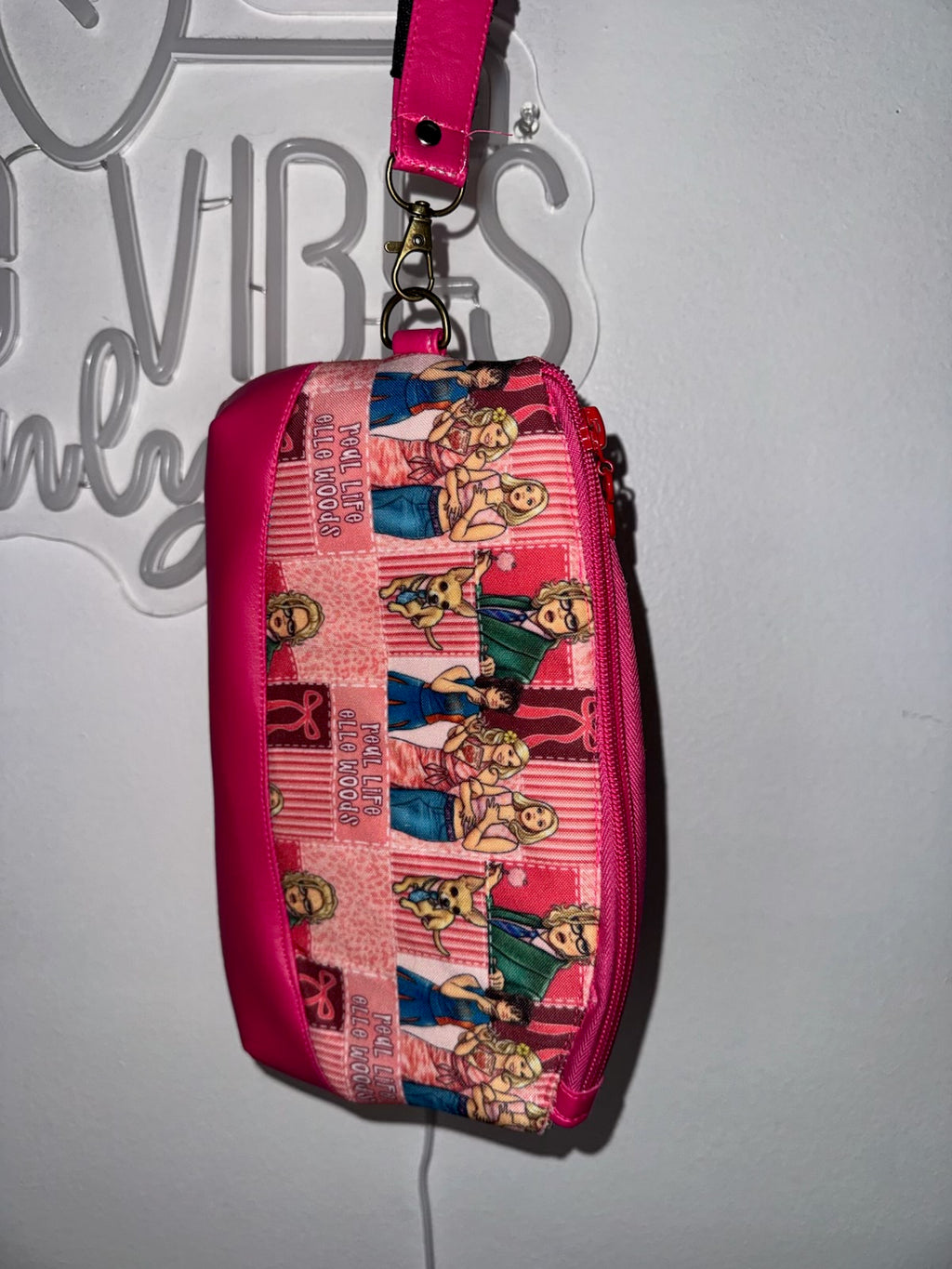 Pink preppy Y2K wristlet, front view with zip top
