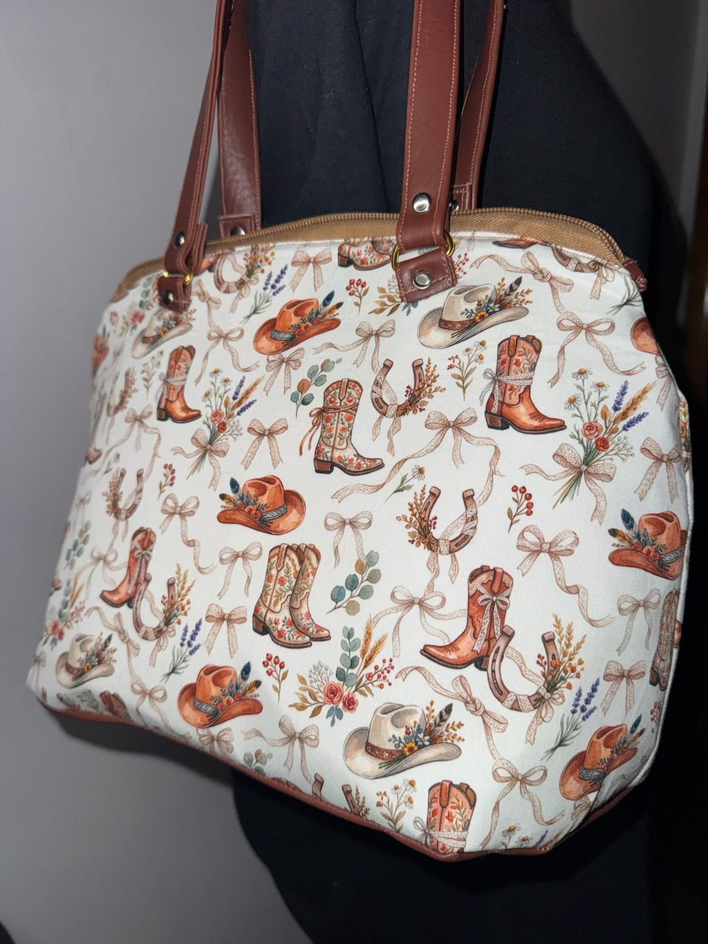 Handmade cowgirl western handbag with cowboy boots, horseshoe, and floral print