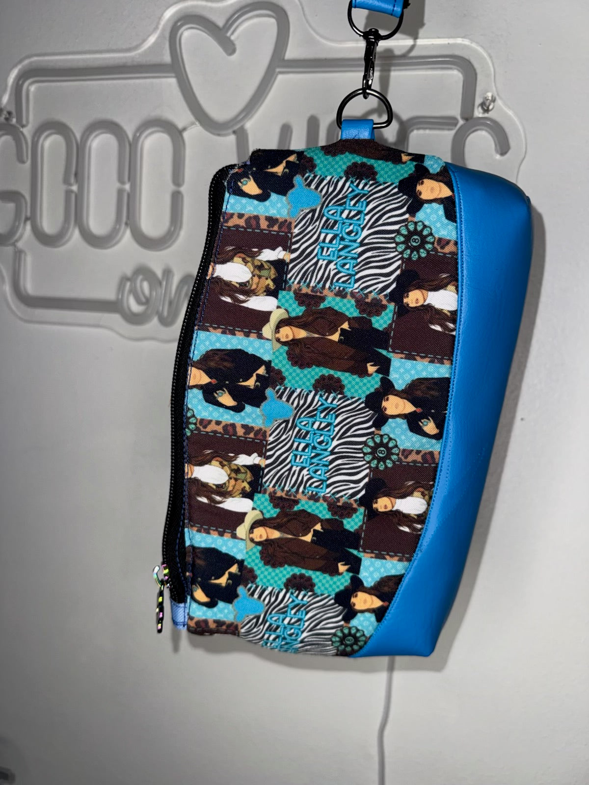 Western cowgirl concert wristlet, front view with zip top