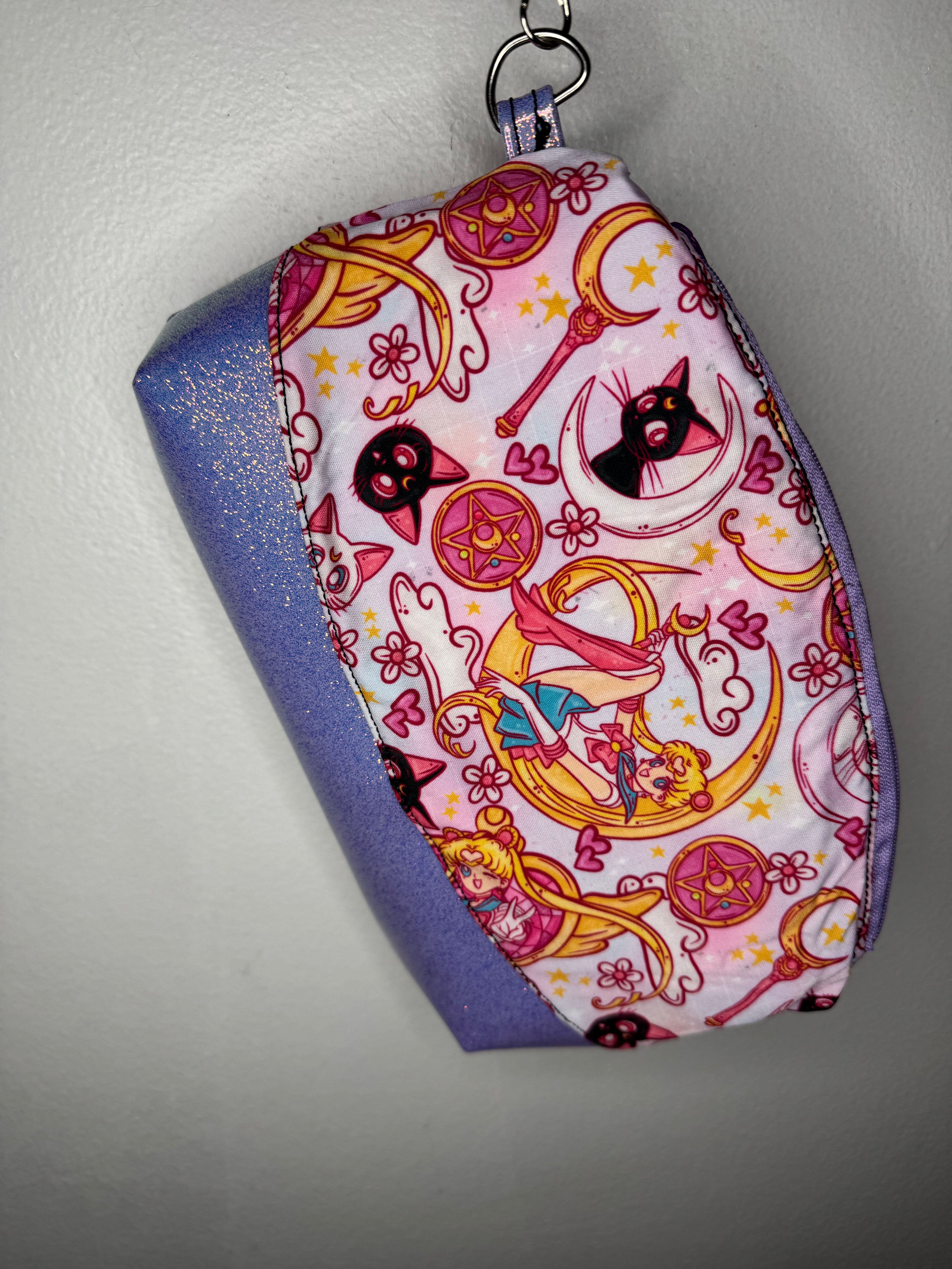 Keychain with colorful design on a plain background