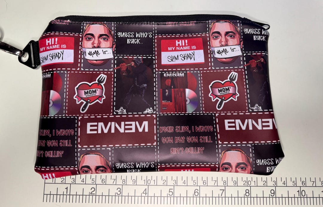 Slim Shady print zipper pouch measured against a ruler