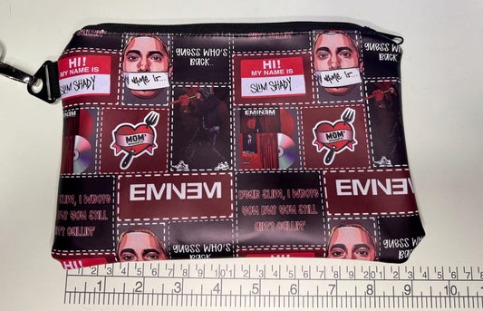 Slim Shady print zipper pouch measured against a ruler