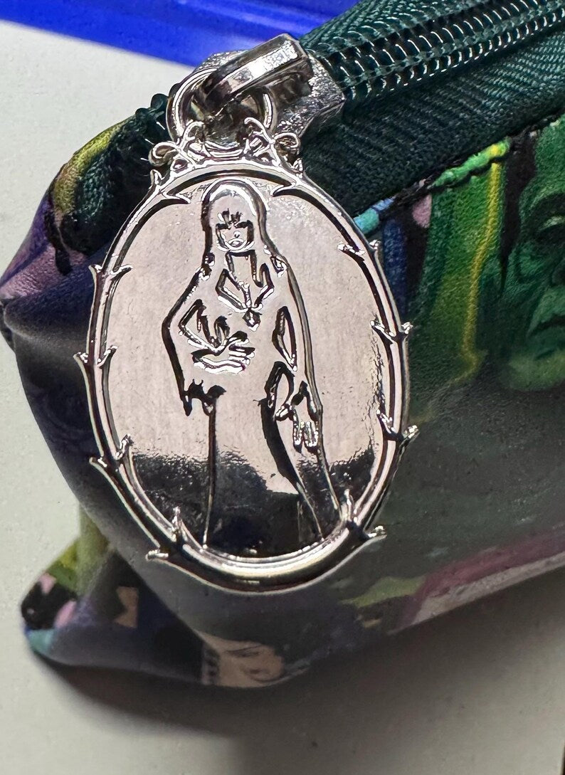 Close-up of silver zipper charm on the horror tarot pouch