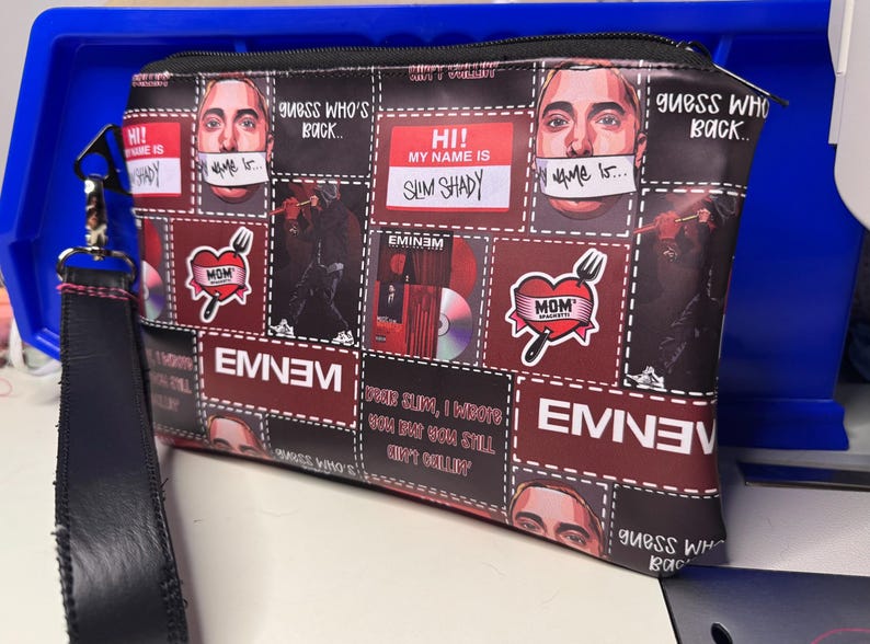 Slim Shady zipper pouch with black wrist strap