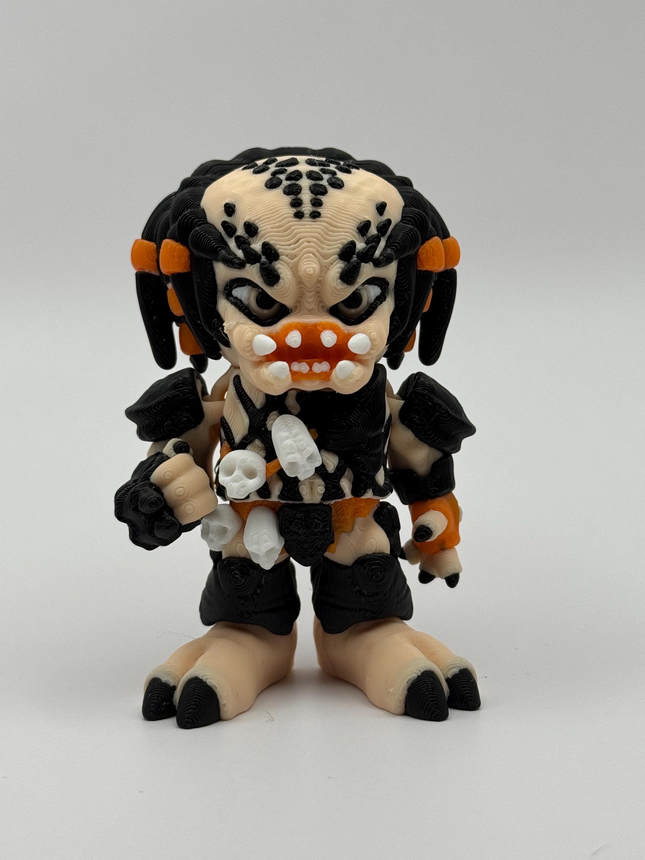 3D Printed Flexi Predator Figurine: Articulated Sci-Fi Desk Toy