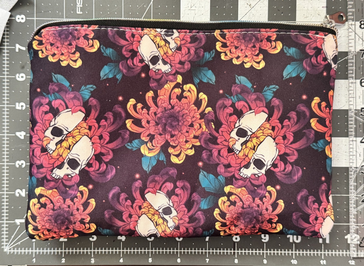 Skull chrysanthemum pouch measured on a cutting mat